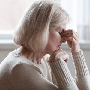 woman suffering from headache